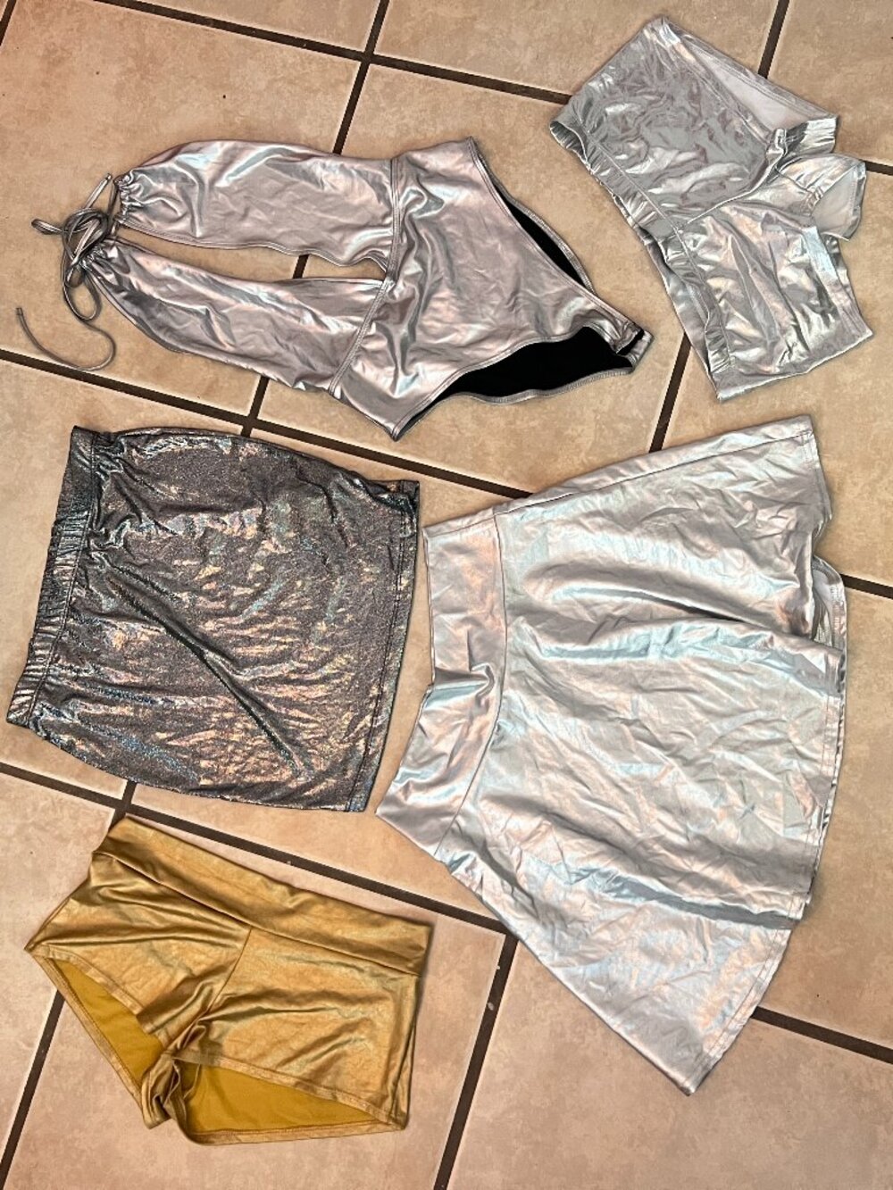 Bundle of holographic/metallic rave clothes
